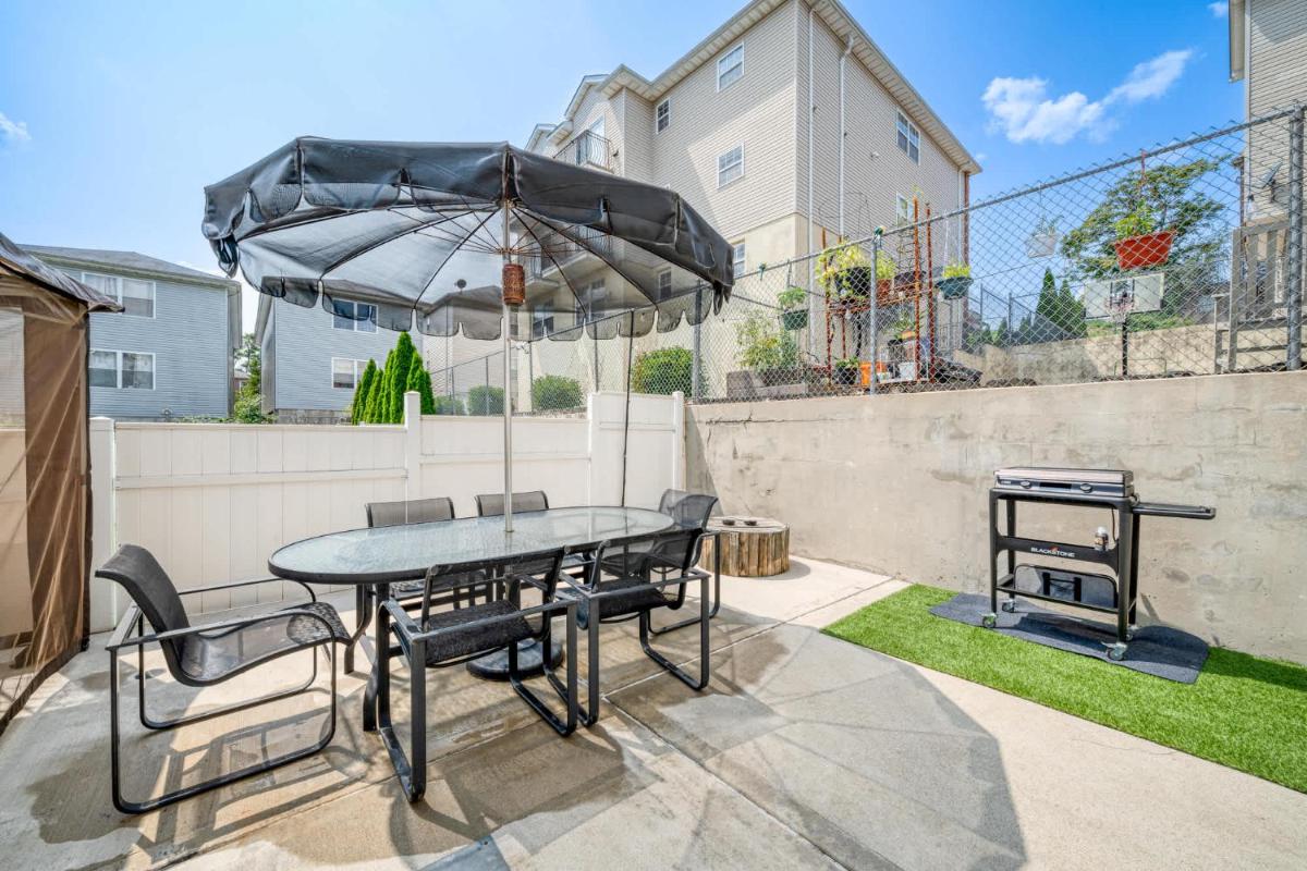 Image 6 of Gated 2-unit rental with movie & game room near NY